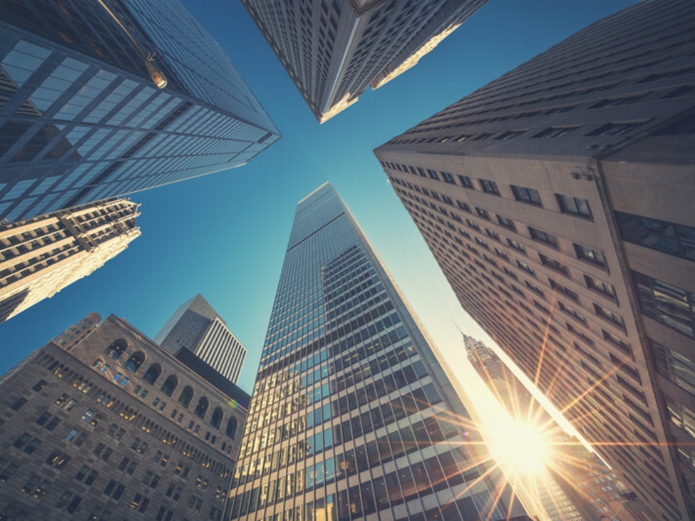 Office building top view background in retro style colors. Manhattan buildings of New York City center - Wall street.jpg