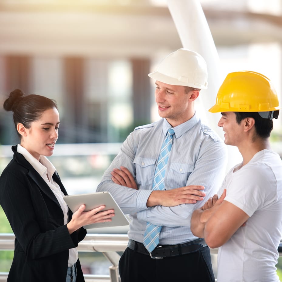 Project Manager Working and Discusses with Professional Engineering Team Training on Construction Site and Building - Teamwork Business Concept